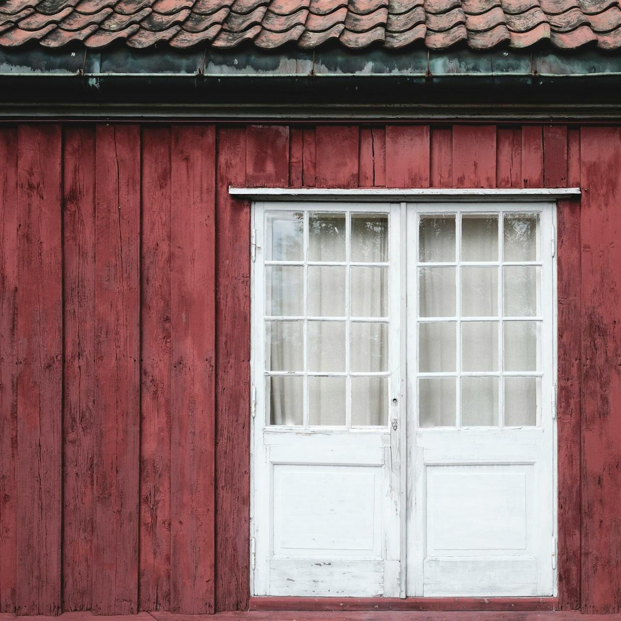photo of closed white wooden window